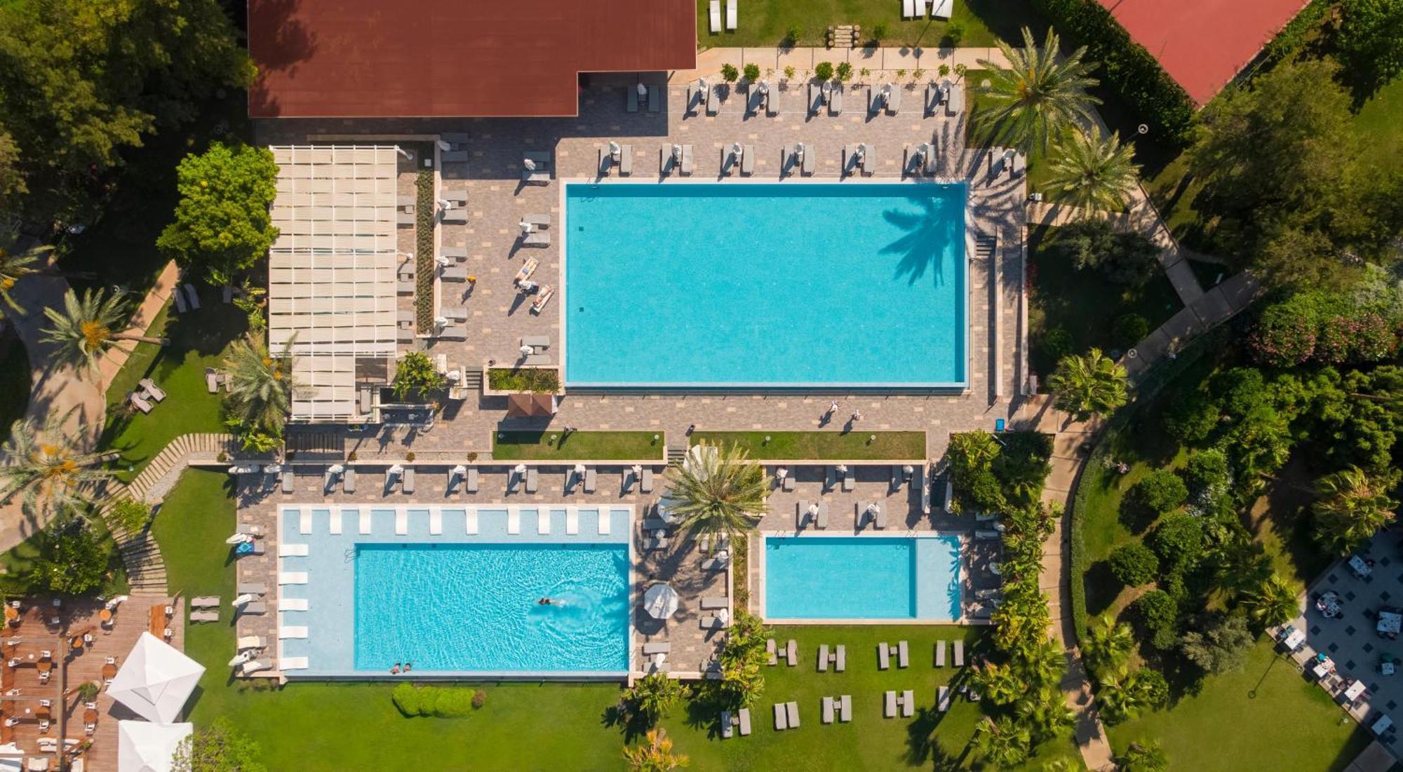 Akra Antalya Hotel Exterior photo Aerial view of the swimming pool