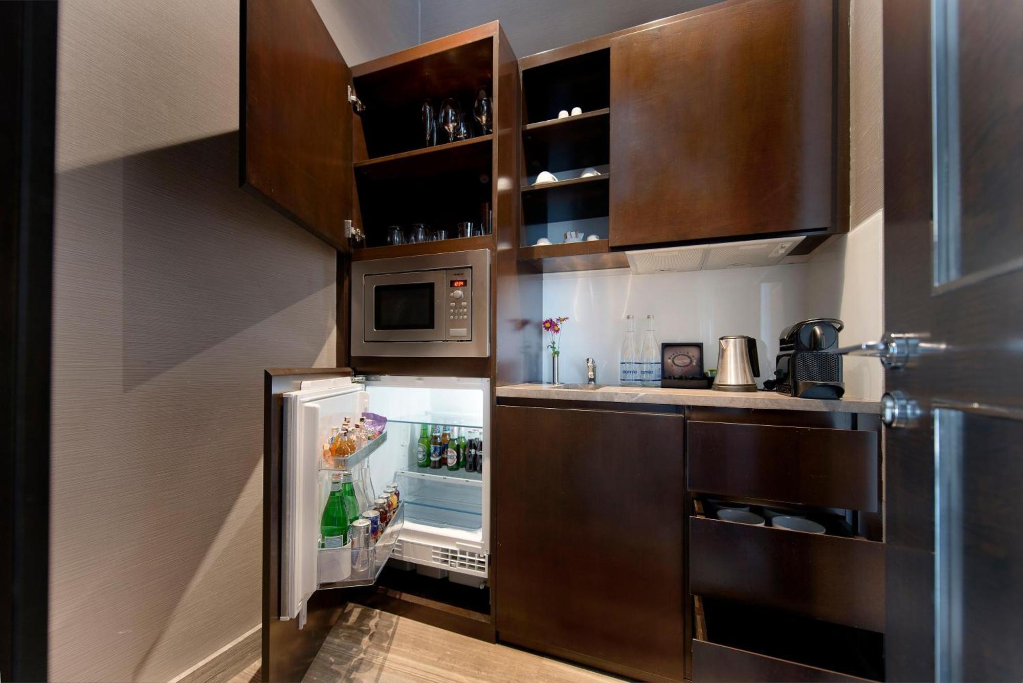 Akra Antalya Hotel Exterior photo A small kitchen in a hotel