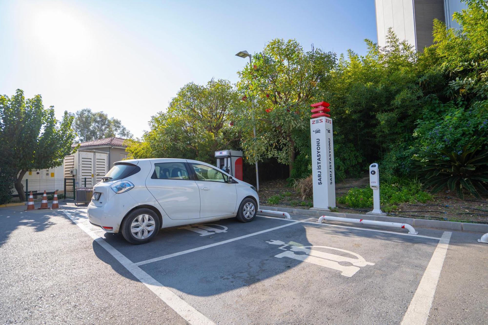Akra Antalya Hotel Exterior photo Renault Zoe at a charging station